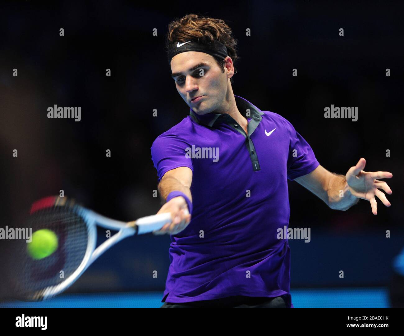 Switzerland's Roger Federer in action against Serbia's Novak Djokovic Stock Photo