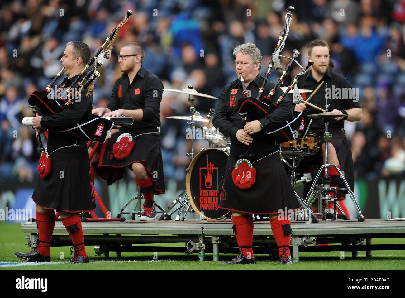 Red Hot Chilli Pipers perform before the match Stock Photo - Alamy