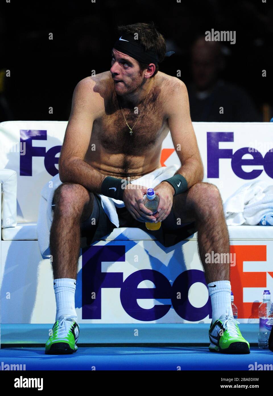 Argentina's Juan Martin Del Potro sits dejected after losing the 2nd set Stock Photo