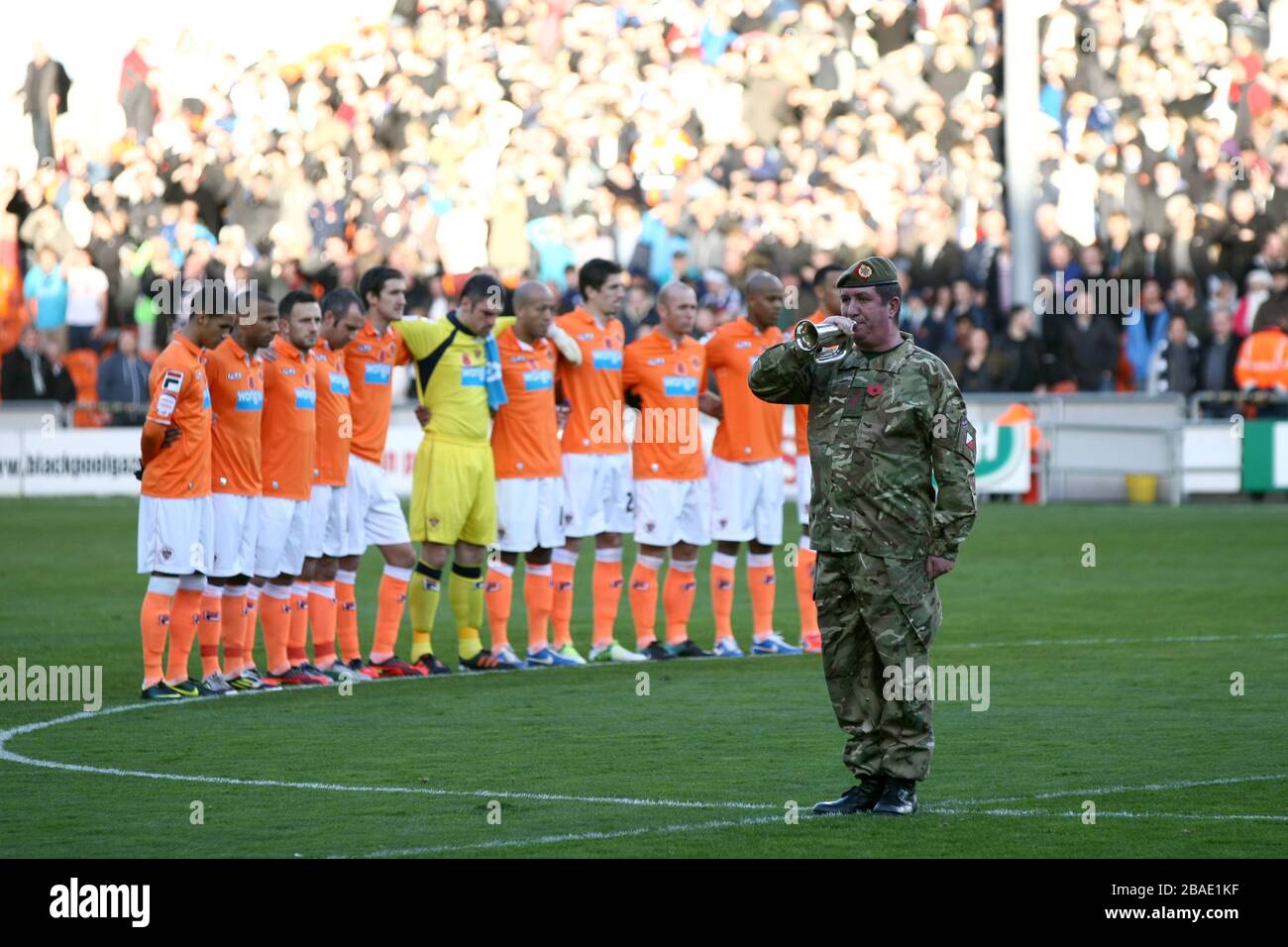 Blackpool players pay their respects during a minutes silence for the armed forces Remembrance Sunday Stock Photo