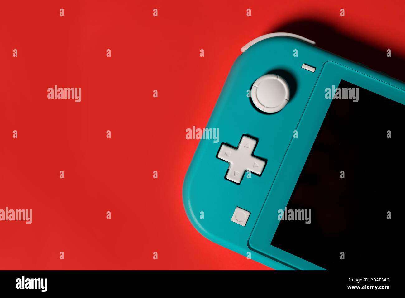 LONDON - MARCH 12, 2020: Nintendo Switch Lite handheld video game console Stock Photo