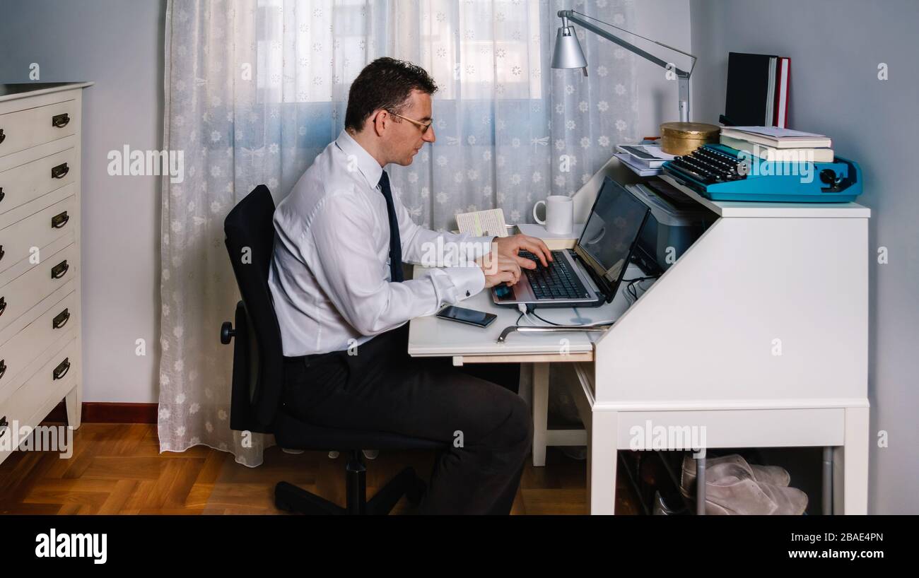 Man teleworking wearing shirt and tie Stock Photo
