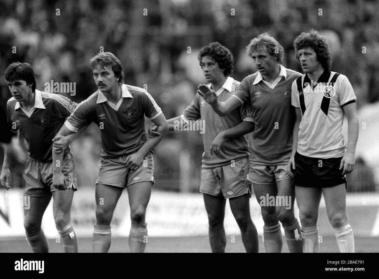 Manchester City face a free kick: (l-r) Manchester City's Ray Ranson, Tony Henry, Barry Silkman and Dragoslav Stepanovic, and Crystal Palace's Mike Flanagan Stock Photo