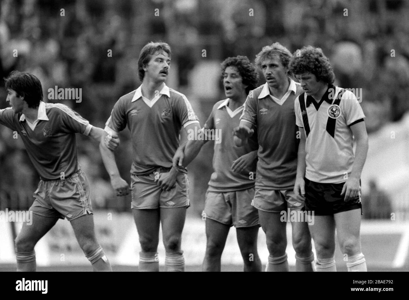 Manchester City face a free kick: (l-r) Manchester City's Ray Ranson, Tony Henry, Barry Silkman and Dragoslav Stepanovic, and Crystal Palace's Mike Flanagan Stock Photo