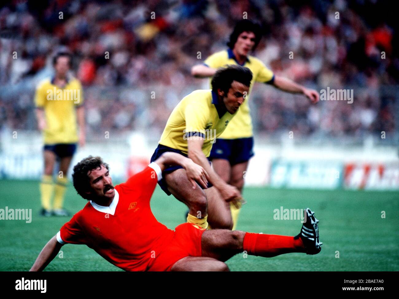 Liverpool's Graeme Souness (l) tackles Arsenal's John Hollins (r) Stock Photo