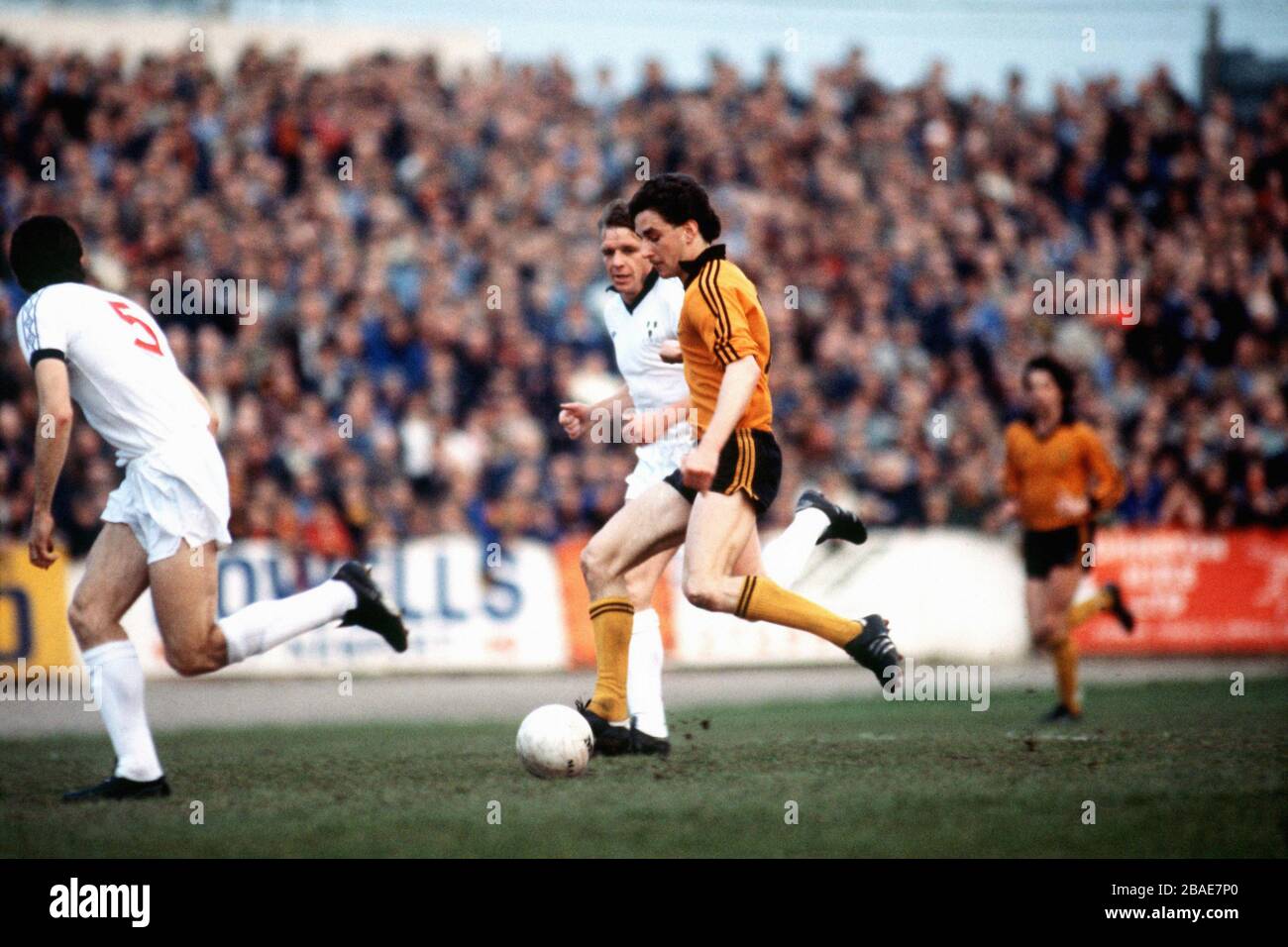Newport County's John Aldridge keeps his eyes on the ball as Shrewsbury Town's Graham Turner (c, half hidden) moves in to tackle Stock Photo