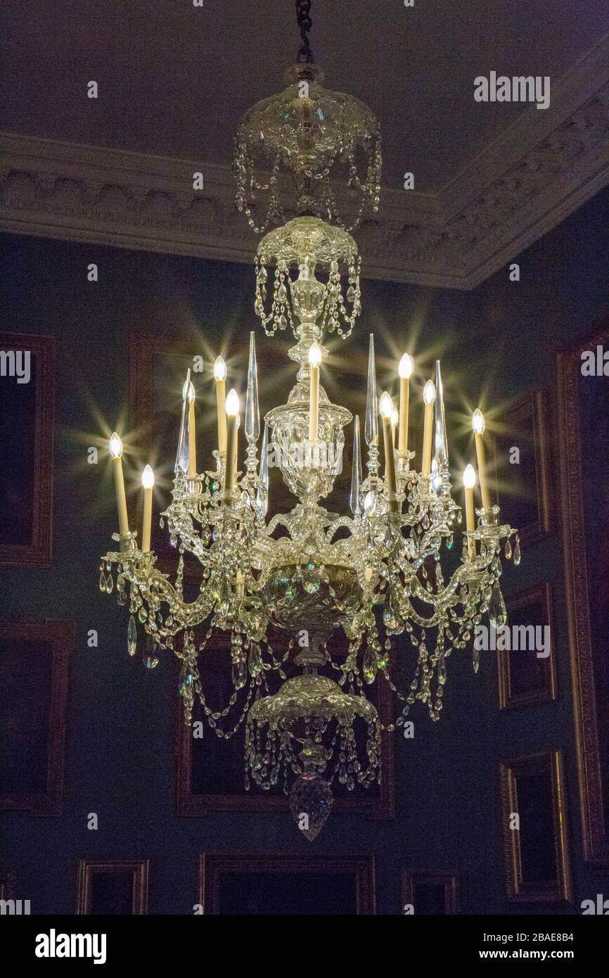 A glittering glass chandelier inside Stourhead House, Wiltshire, England, UK Stock Photo