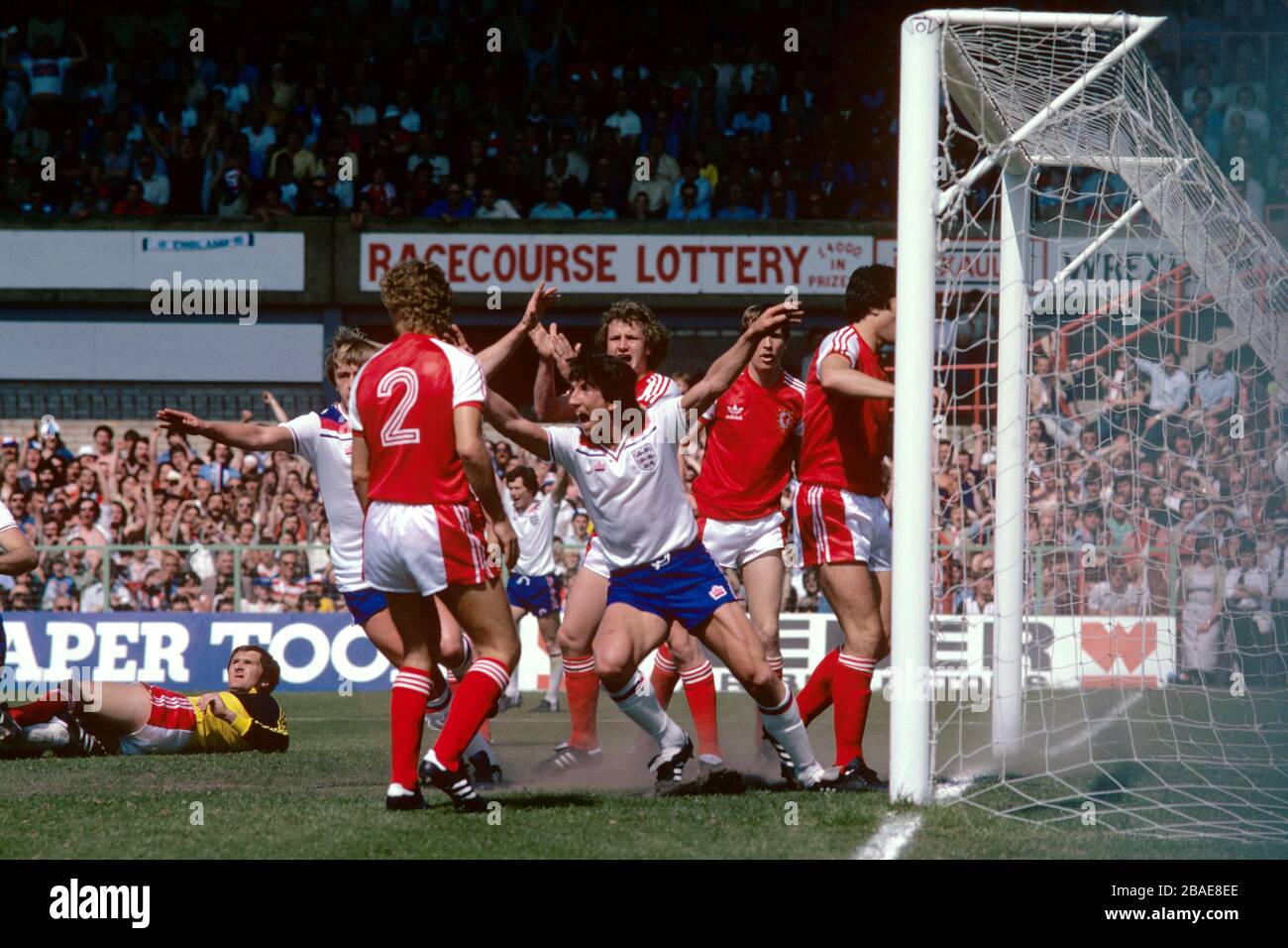 England's Paul Mariner (c) celebrates scoring his team's only goal of the game as Wales's Peter Nicholas (c, behind Mariner) appeals for handball Stock Photo