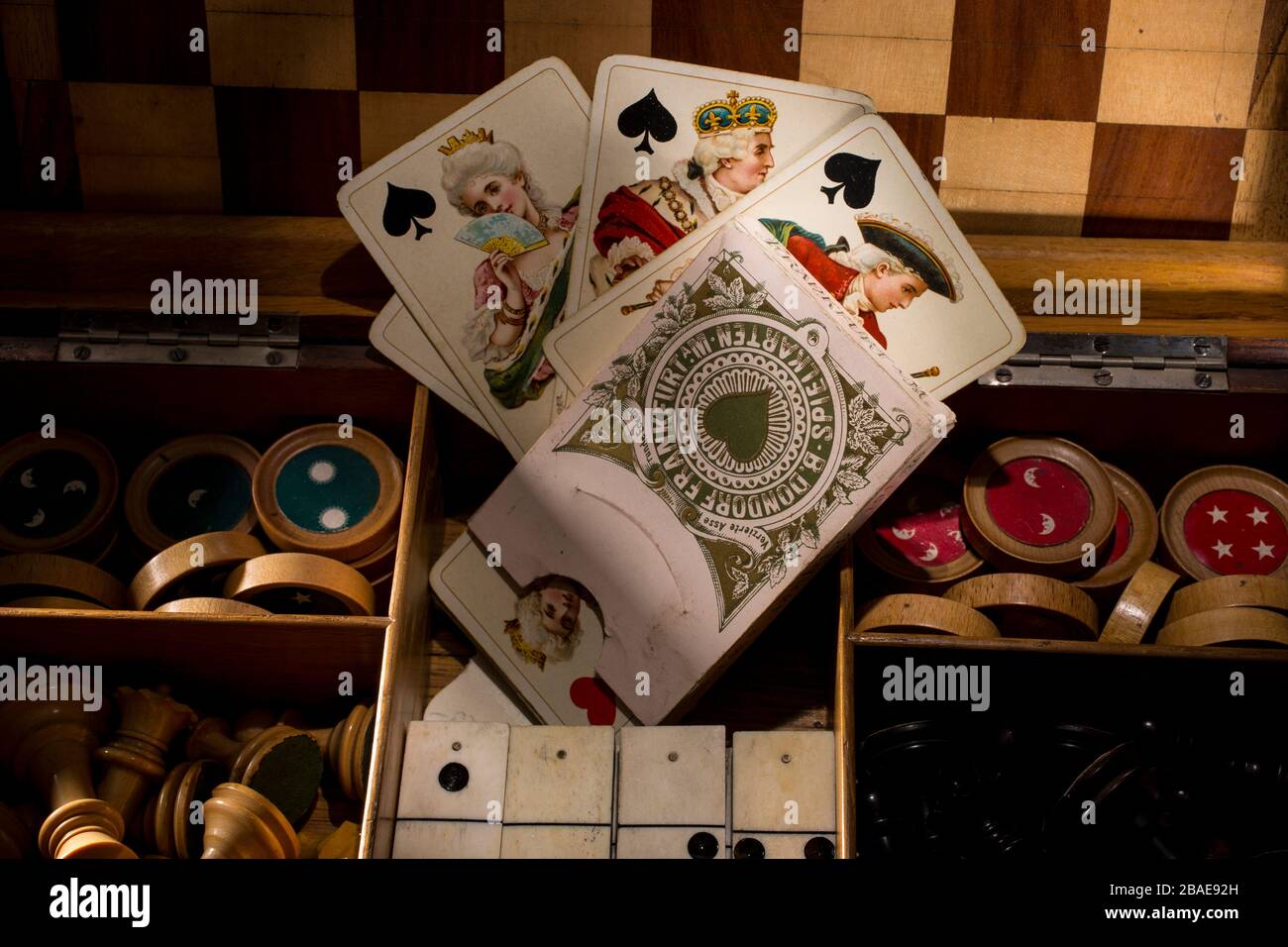 Box with antique board games. Stock Photo