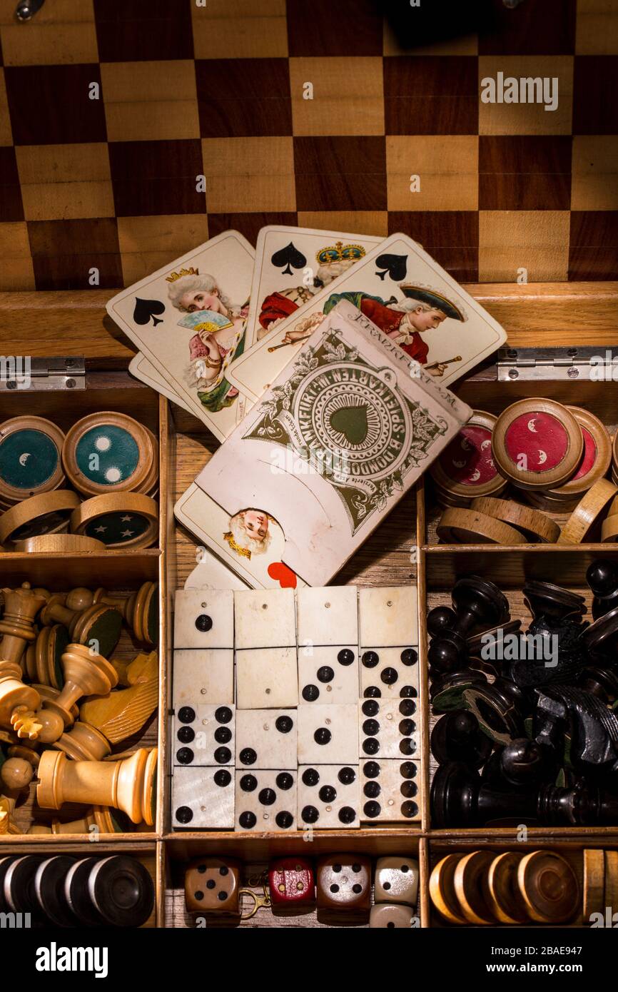 Box with antique board games. Stock Photo