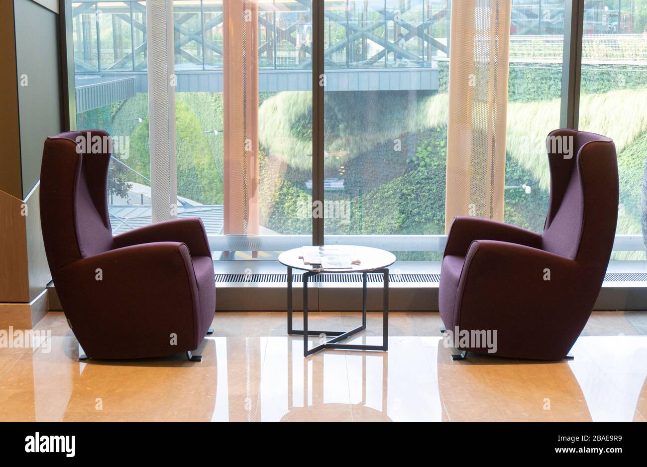 two empty chairs at office and green view Stock Photo Alamy