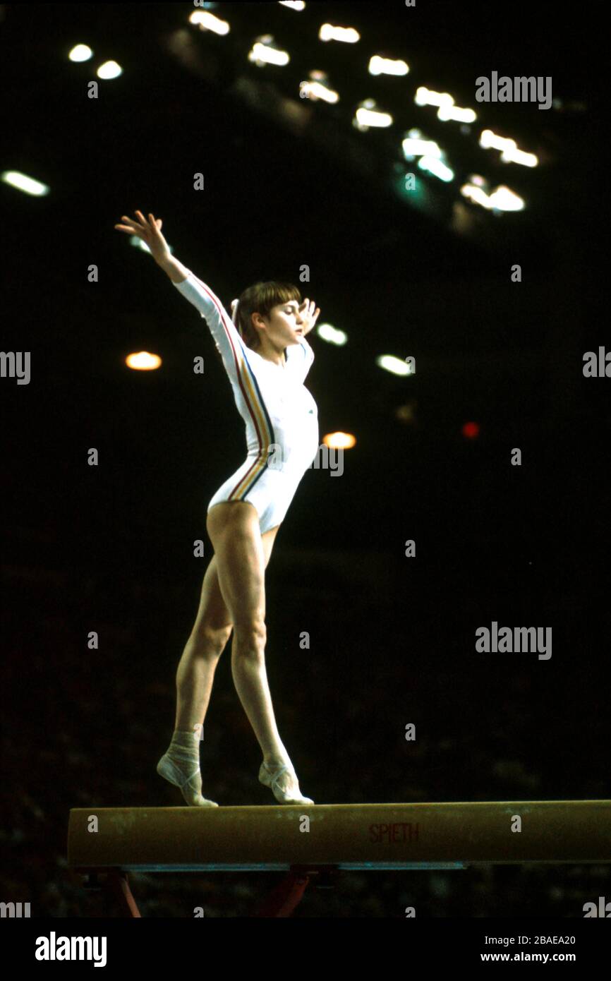 Romania's Nadia Comaneci performing on the bar Stock Photo