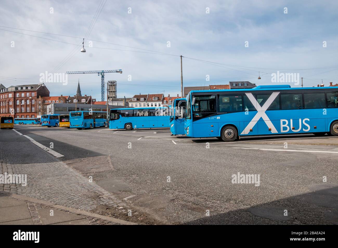 Aarhus, Denmark - 24 march 2020: Aarhus bus station located in the city  center, blue buses are waiting for passengers, City Hall tower is seen in  the Stock Photo - Alamy