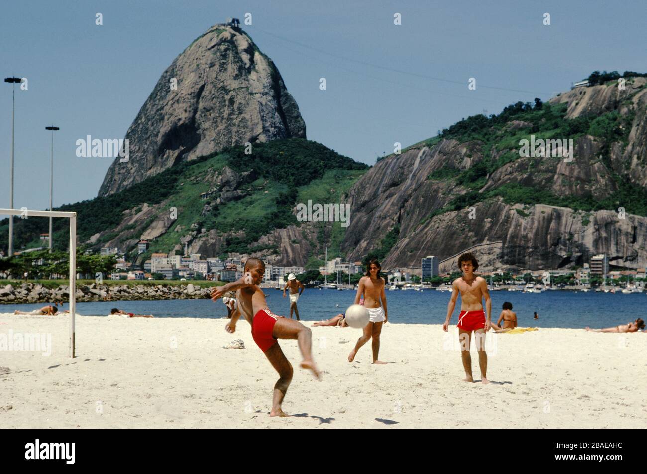 People playing soccer on the beach in Rio de Janeiro Stock Photo