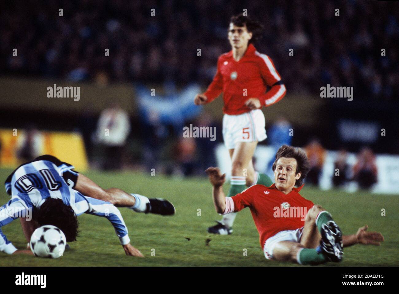 Argentina's Mario Kempes (l) is hacked down by Hungary's Gyozo Martos (r) Stock Photo
