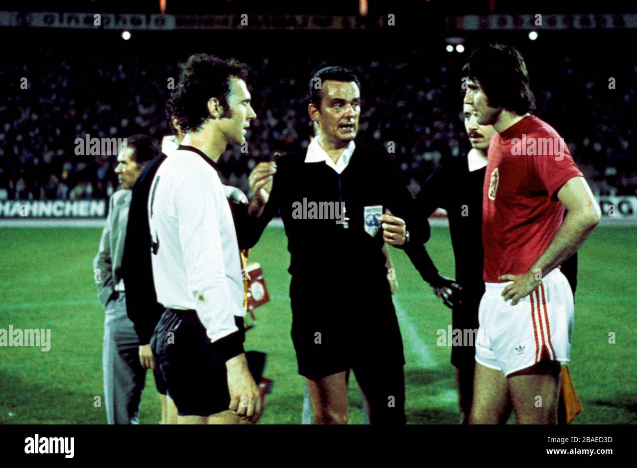 West Germany captain Franz Beckenbauer (l) and Anton Ondrus, Czechoslovakia captain (r) with Referee Sergio Gonella (c) Stock Photo