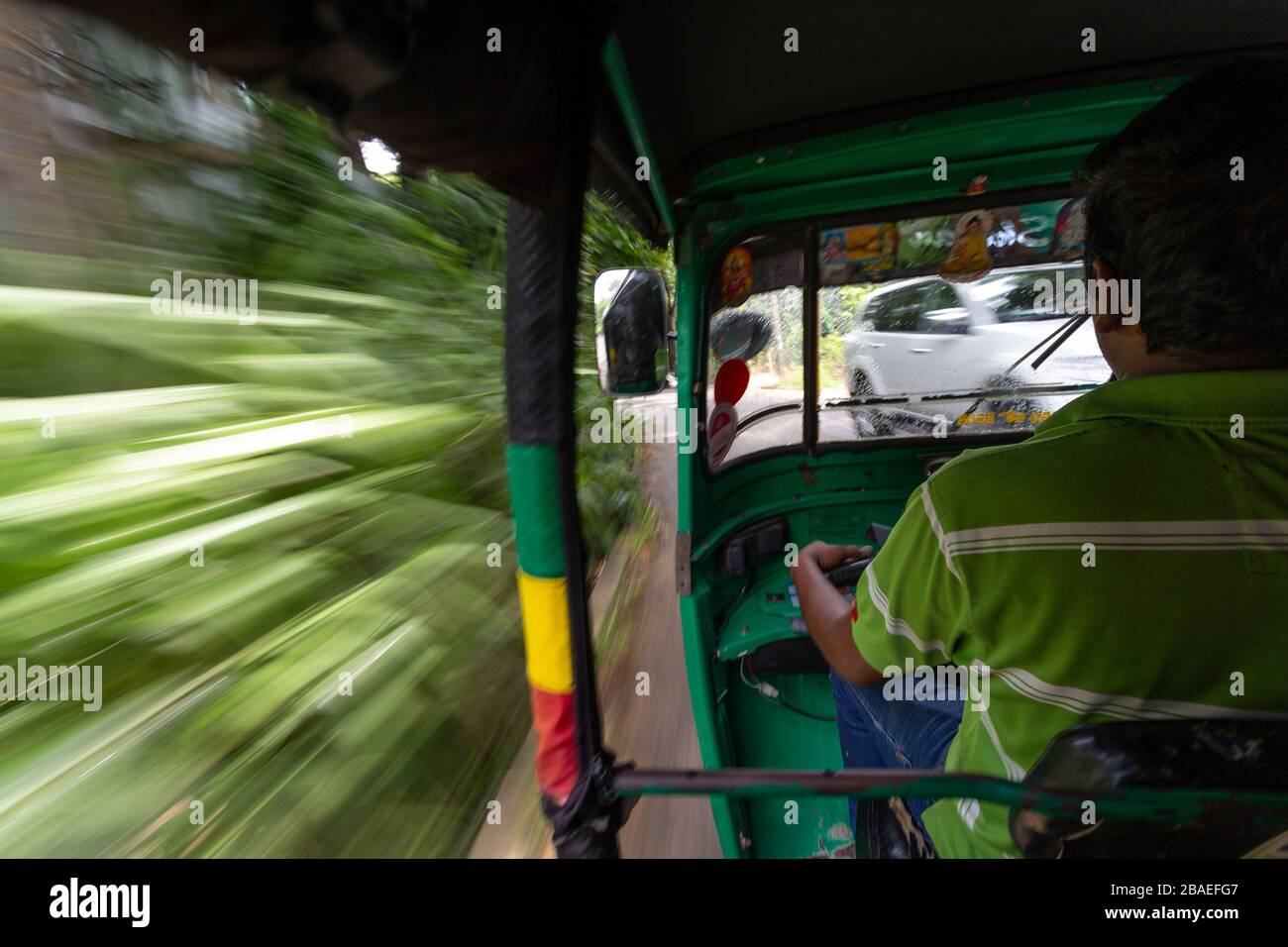 Speeding along in an auto-rickshaw in Kandy, Sri Lanka Stock Photo