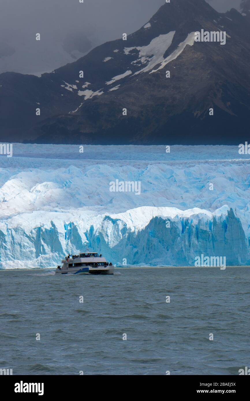 Boat on the Perito Moreno glacier in El Calafate, Patagonia, Argentina Stock Photo