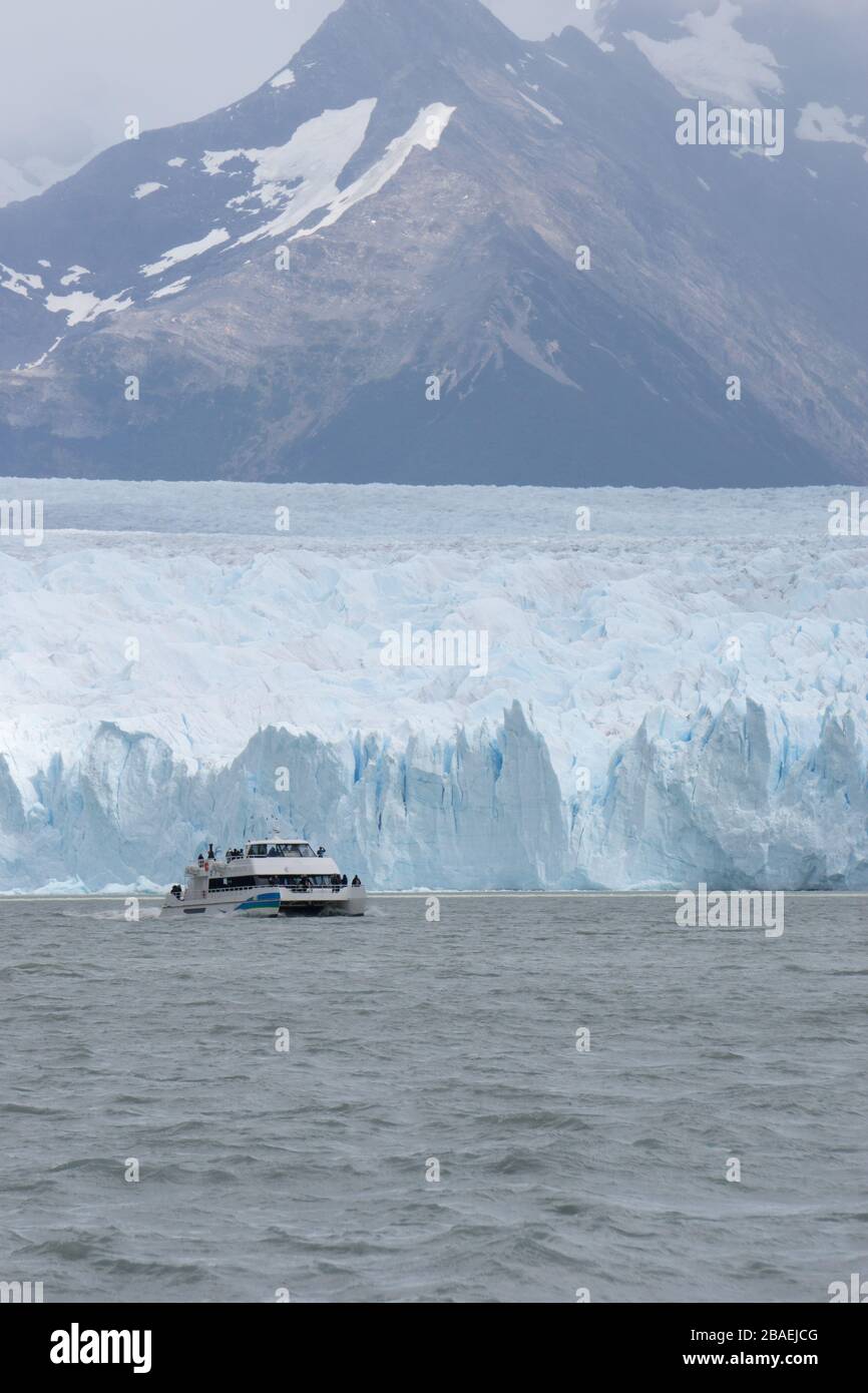 Boat on the Perito Moreno glacier in El Calafate, Patagonia, Argentina Stock Photo