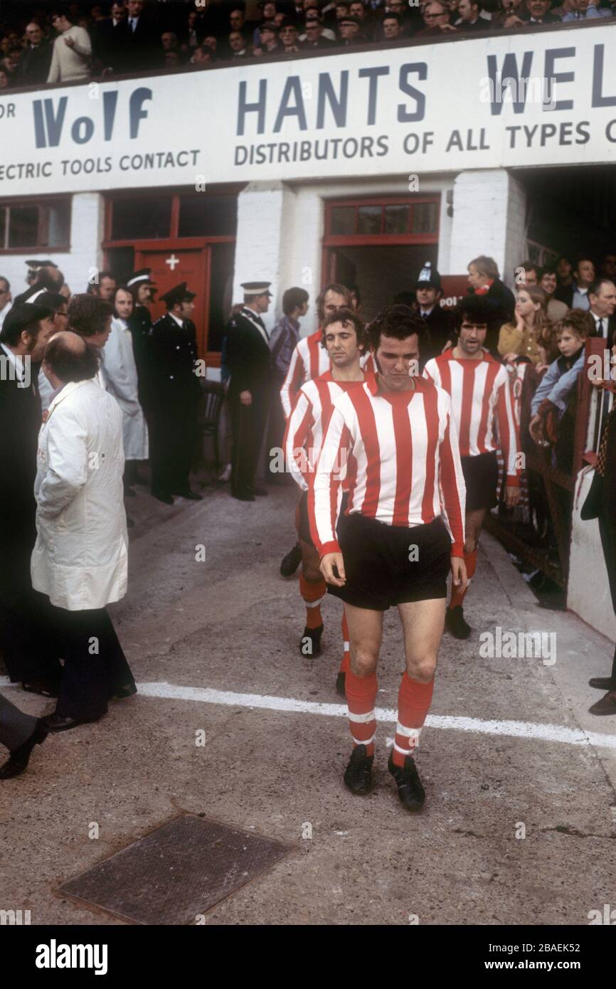 Terry Paine leads out his Southampton teammates Brian O'Neil (l) and Hugh Fisher (r). Stock Photo