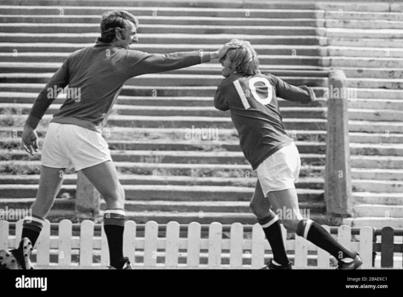 Manchester United's Denis Law (r) play fights with goalkeeper Alex Stepney (l) during a photocall. Stock Photo