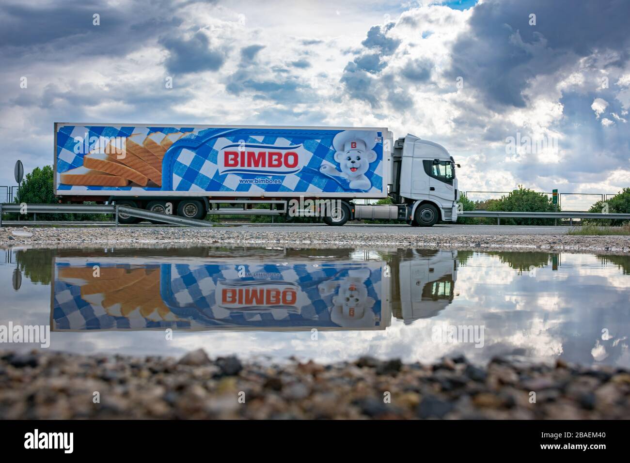 Truck with refrigerated semi-trailer transporting fresh products from the Bimbo brand Stock Photo