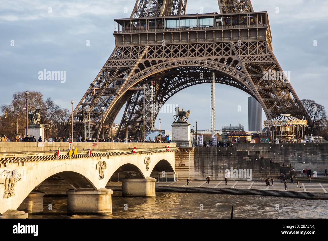 Paris , France - December 15, 2019: View on the famous paris eiffel tower from the promenade of the Seine . Stock Photo
