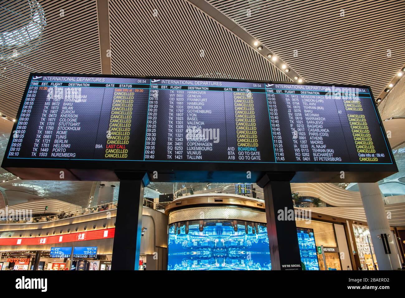 Istanbul, Turkey – March 21, 2020. Screen at the departures terminal showing that almost all international departures from Istanbul Airport are cancel Stock Photo