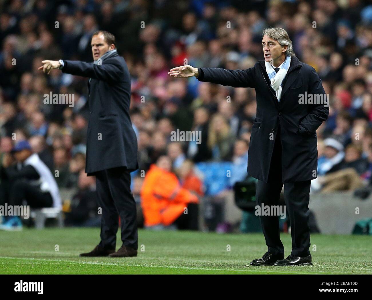 Manchester City manager Roberto Mancini (right) and Ajax manager Frank De Boer on the touchline Stock Photo