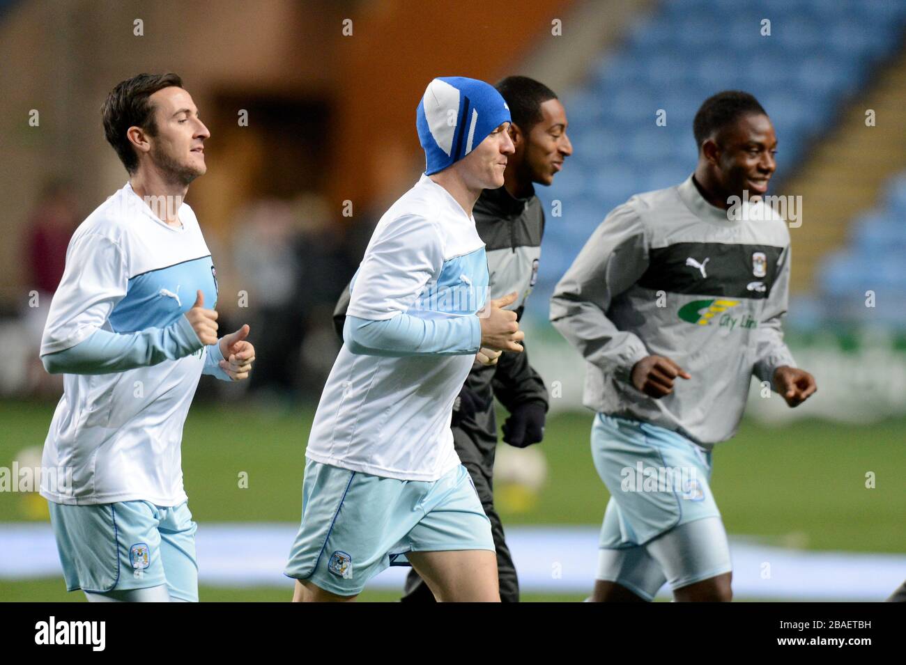 Coventry City's Roy O'Donovan, Gary McSheffrey, Jordan Clarke and Franck Moussa (left to right) warm up before the game Stock Photo