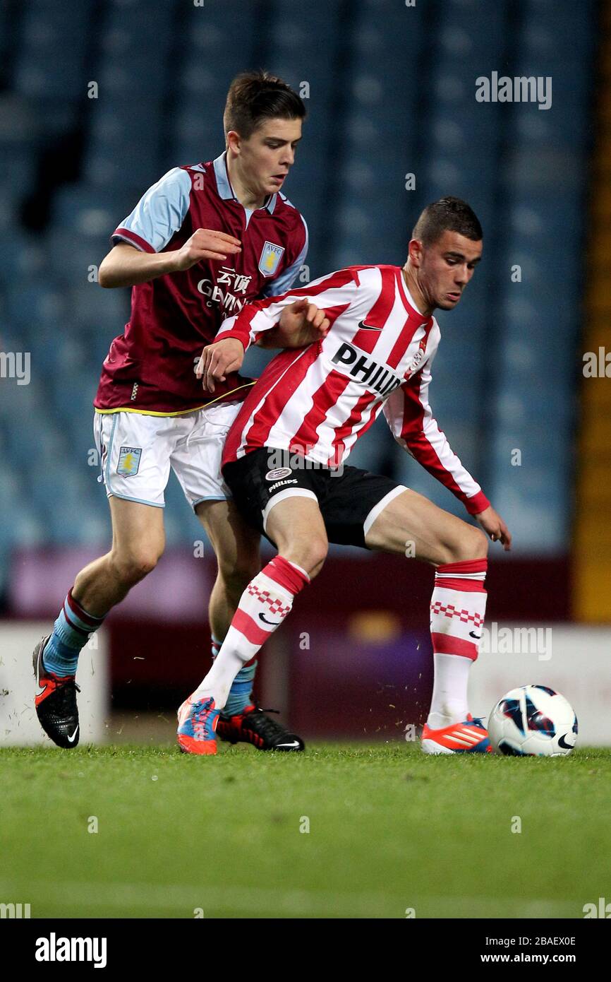 Aston Villa's Jack Grealish and PSV Rai Vloet (right) battle for the ball Stock Photo - Alamy