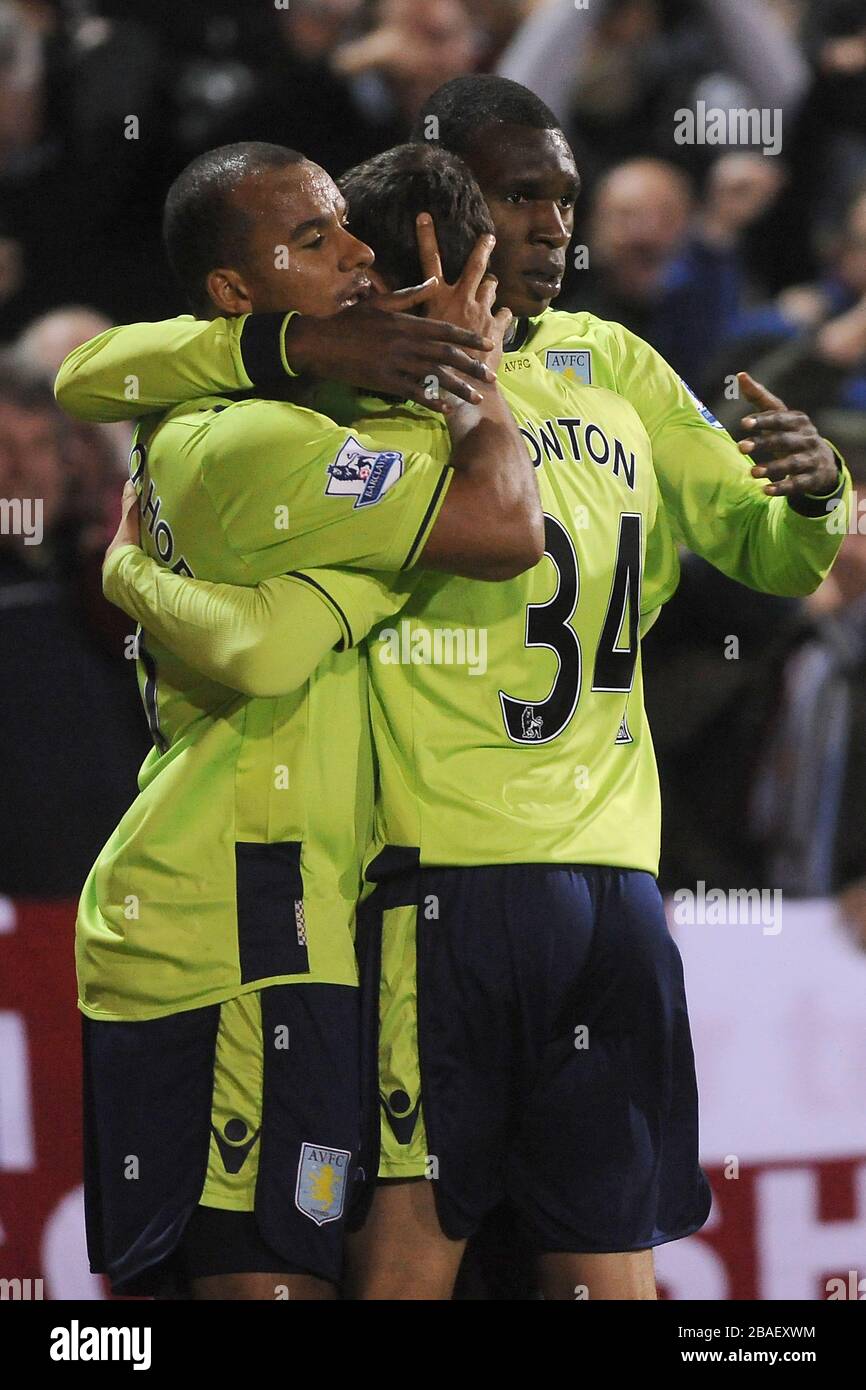 Aston Villa's Christian Benteke (right) celebrates his winning goal with teammates Stock Photo