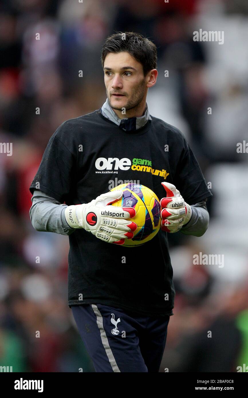 Tottenham Hotspur goalkeeper Hugo Lloris warms up wearing a One Game  Community anti-racism t shirt Stock Photo - Alamy
