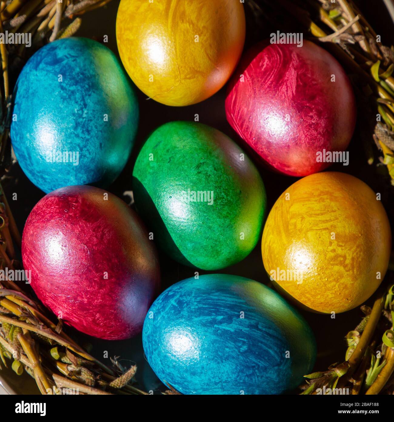 Colorful easter eggs in nest on white background with shadow Stock ...