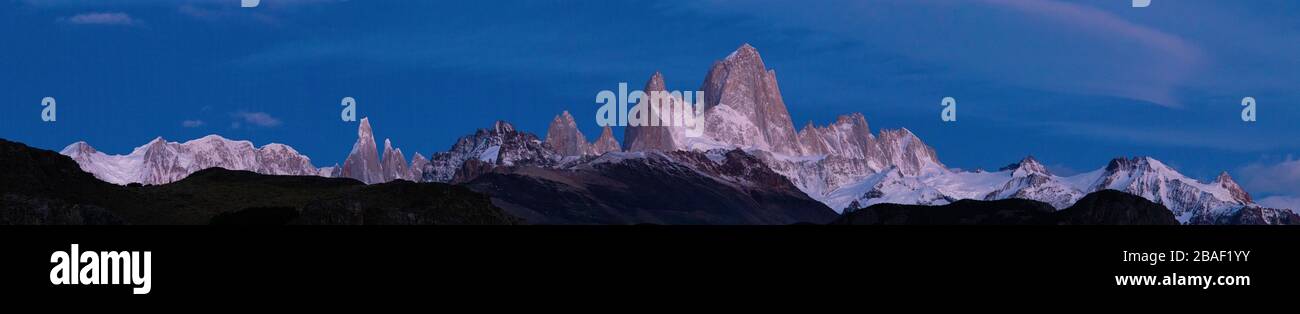 A Panoramic photo of sunrise over Mount Fitzroy in El Chalten in Southern Patagonia, Argentina Stock Photo