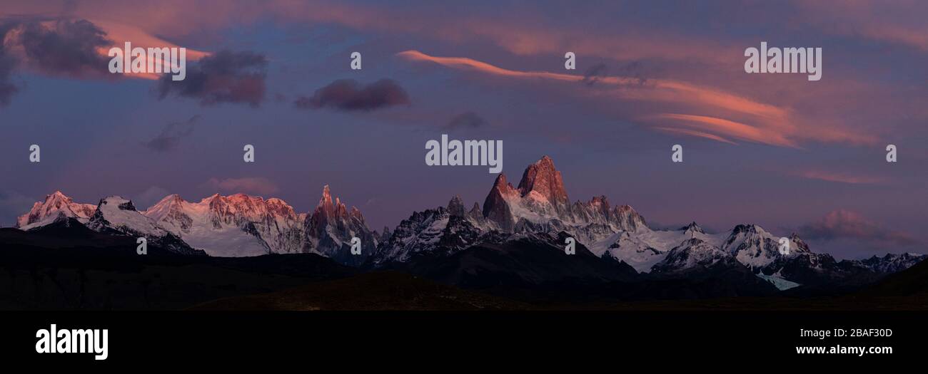 A Panoramic photo of sunrise over Mount Fitzroy in El Chalten in Southern Patagonia, Argentina Stock Photo