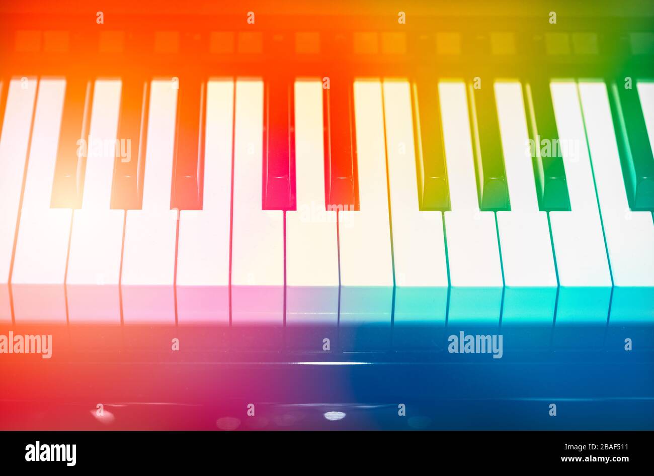 colorful piano keyboard musical note pad for creative music education fun school poster background. Stock Photo