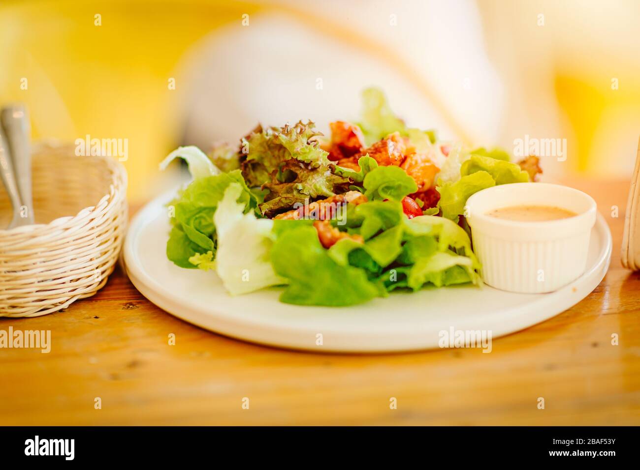 vegetable salad vegan menu fresh clean food with cream sauce for healthy on wooden table Stock Photo