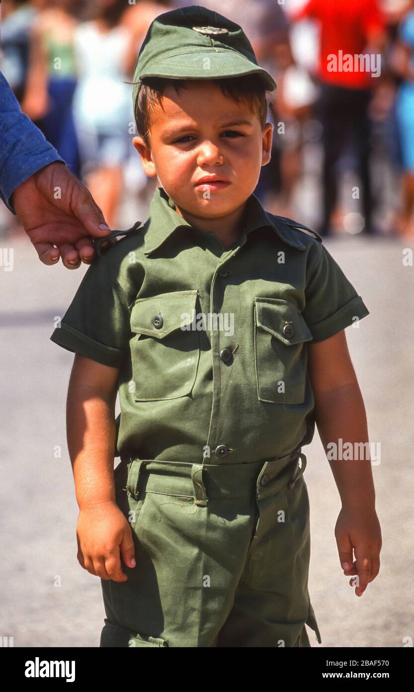 PLAYA GIRON, CUBA, 1991 - Young boy in military uniform during commemoration of 30th anniversary of Bay of Pigs Invasion in 1961. Stock Photo