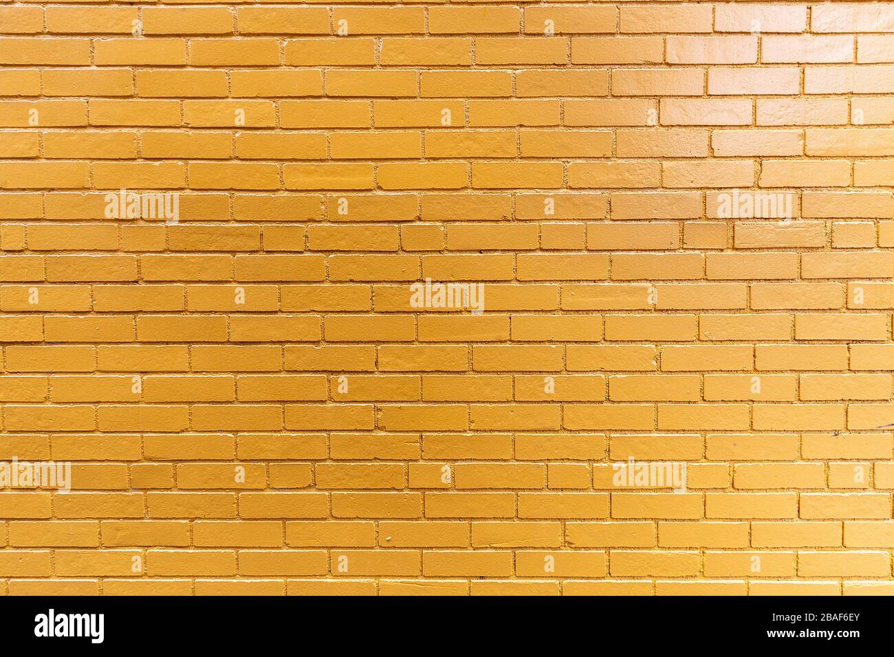 Orange Painted Brick Wall for Background Stock Photo