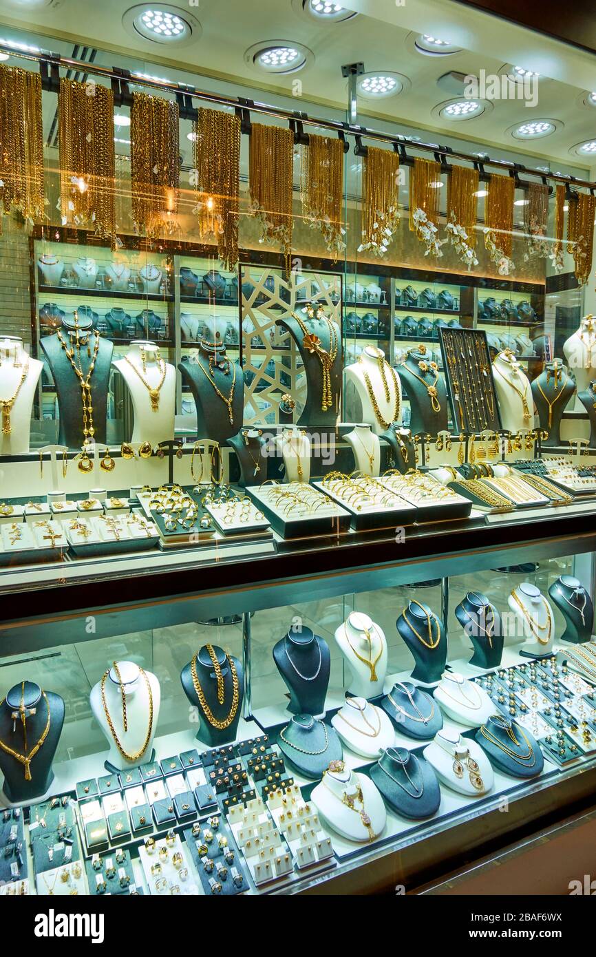Dubai, UAE - January 31, 2020: Shop window of a jewelery store with gold ware at the Golden Souk market in Dubai, United Arab Emirates Stock Photo