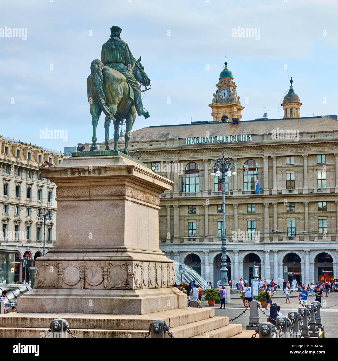 Genoa, Italy - July 6, 2019: Statue of Giuseppe Garibaldi on De Ferrari square and walking people in Genoa Stock Photo