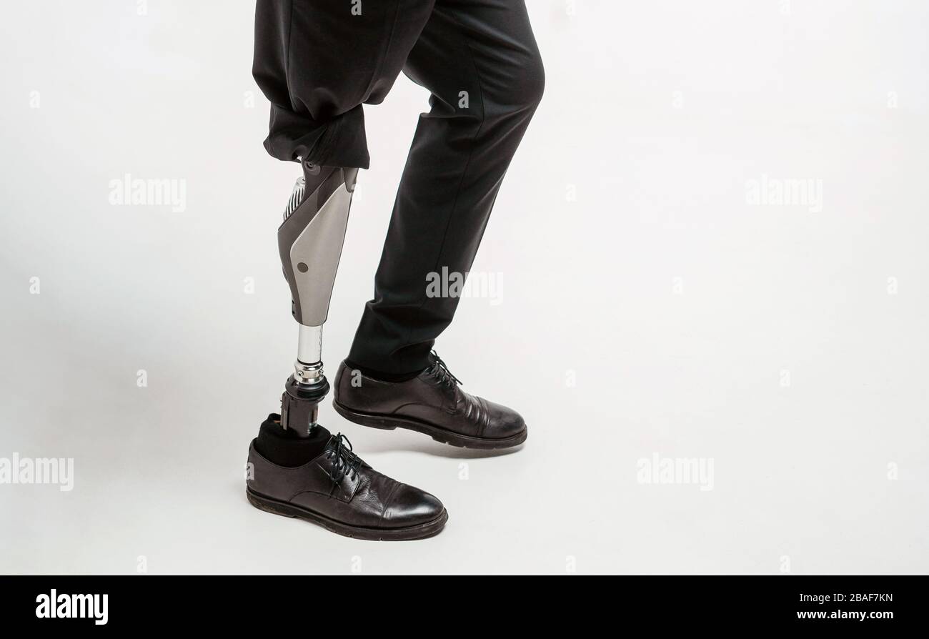Disabled young man with prosthetic leg, artificial limb concept Stock Photo