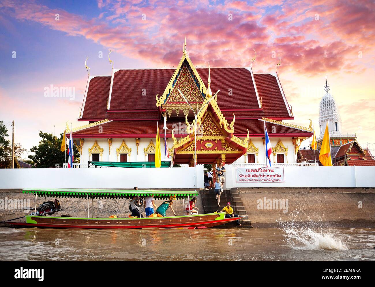 Aythaya, Thailand - November 20, 2016: Tourist near Thai Temple at cruise by Long tail boat on Chao Phraya River Stock Photo