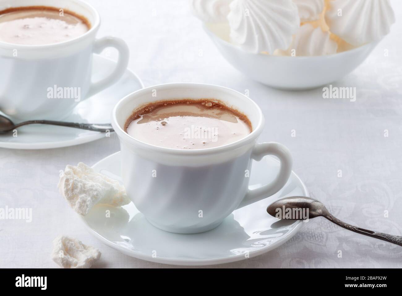 A cup of fresh coffee with cream and a gentle, airy Bizet Stock Photo