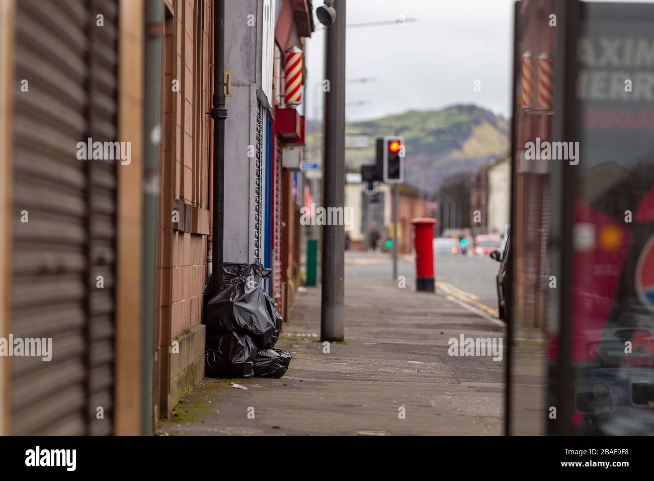 Clydebank, UK. 27th Mar, 2020. Bin collections and recycling has been reduced in the area which is having an immediate effect Credit: Colin Poultney/Alamy Live News Stock Photo