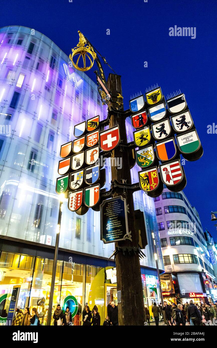 Cantonal Tree displaying the coats of arms of 26 cantons of Switzerland, Leicester Square, London, UK Stock Photo
