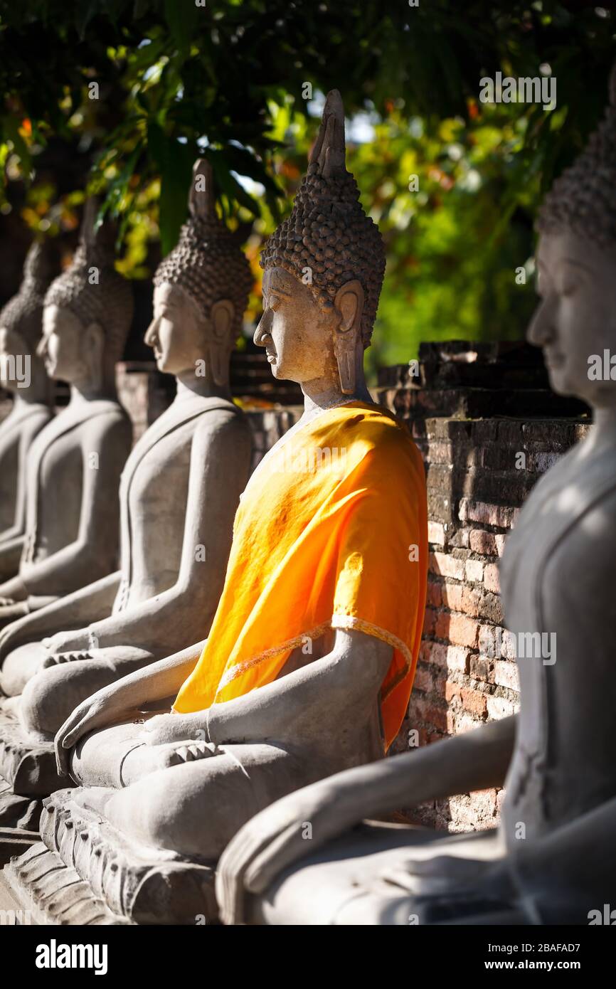 Buddha statues in Wat Yai Chai Mongkol monastery in Ayuttaya, Thailand Stock Photo