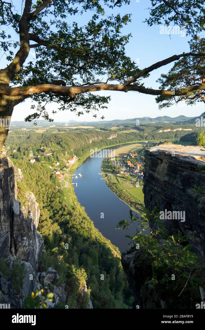 View of the German Elbe River near the Bastei in the afternoon in summer, Elbe Sandstone Mountains, Saxon Switzerland National Park, State of Saxony, Stock Photo