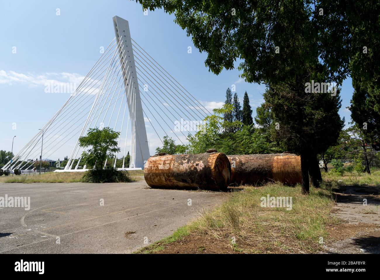 Old rusty tank next to the  Millennium Bridge, Podogrica, Montenegro, Europe Stock Photo